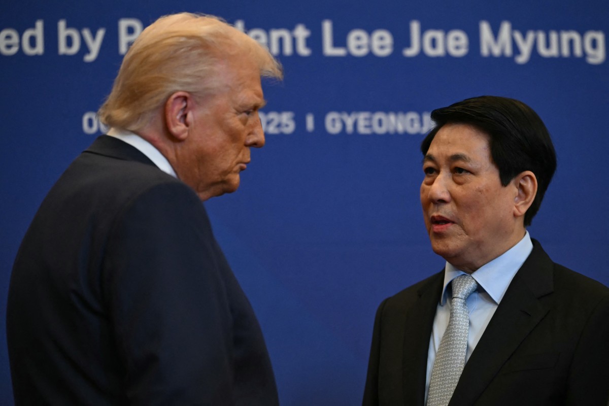 US President Donald Trump speaks with Vietnam's President Luong Cuong upon their arrival for a special dinner hosted at the Hilton Gyeongju hotel in Gyeongju, South Korea. (AFP)