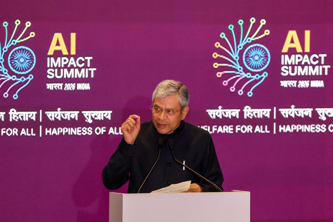 India's Minister of Electronics and Information Technology Ashwini Vaishnaw delivers a speech during the AI Impact Summit in New Delhi on February 19, 2026. (Photo by Ludovic MARIN / AFP)