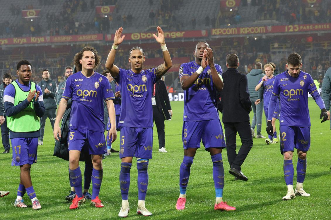 Monaco’s players celebrate after winning their French L1 match against Lens at the Stade Bollaert-Delelis stadium in Lens on Feb. 21, 2026. (AFP)