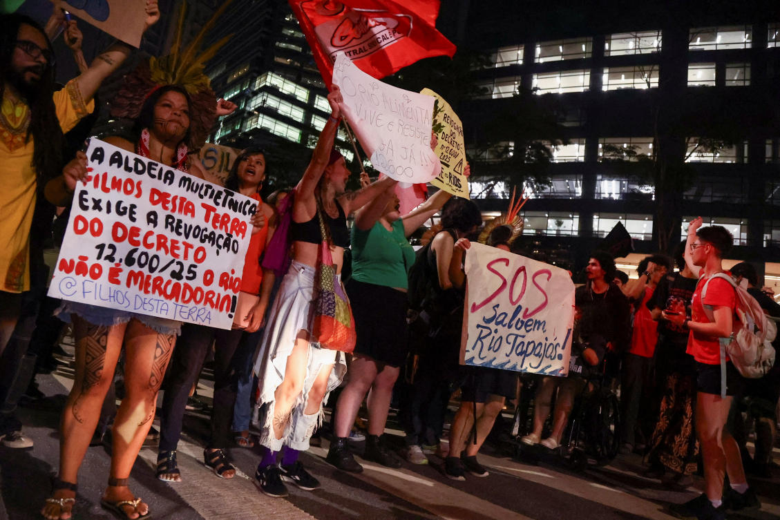 Above, indigenous groups at Cargill’s offices in Sao Paulo, Brazil to protest against plans to dredge the Tapajos river and move more grains like soy and corn destined for export markets. (Reuters)