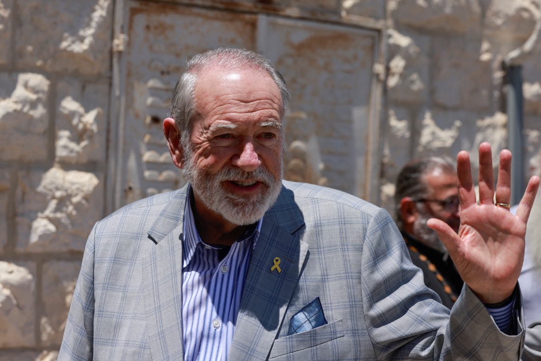 US ambassador to Israel Mike Huckabee visits the Palestinian Christian village of Taybeh, northeast of Ramallah in the occupied West Bank. (AFP)