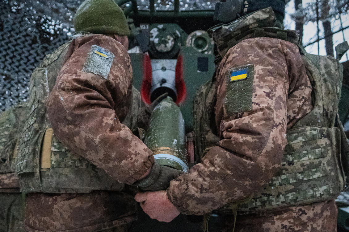Ukrainian servicemen load an artillery shell before firing at Russian positions on the front line in Kharkiv region of Ukraine on Feb. 18, 2026. (AP)