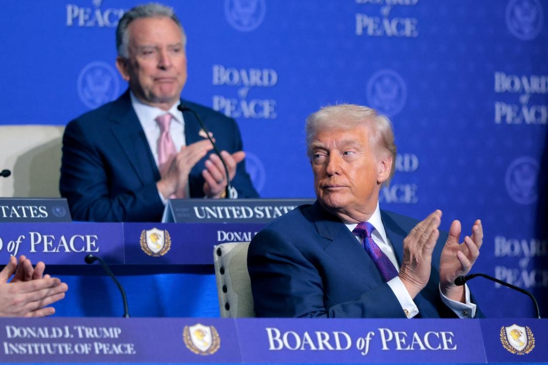 President Donald Trump (R) and Special Envoy to the Middle East Steve Witkoff clap during the inaugural meeting of the Board of Peace at the Donald J. Trump Institute of Peace on February 19, 2026 in Washington, DC. (FILE/AFP)