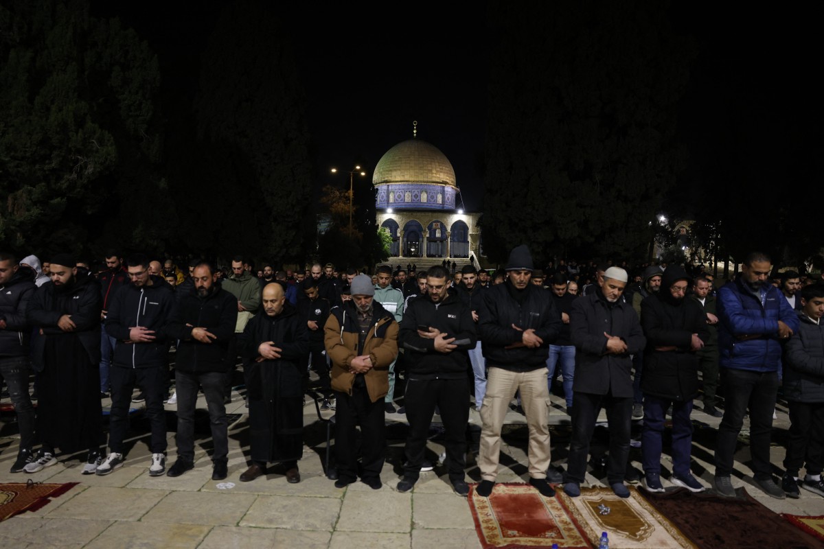 Muslim worshippers perform Tarawih prayers on the first night of the Islamic holy month of Ramadan near the Dome of the Rock at the Al-Aqsa Mosque compound in the Old City of Jerusalem, Feb. 17, 2026. (AFP)