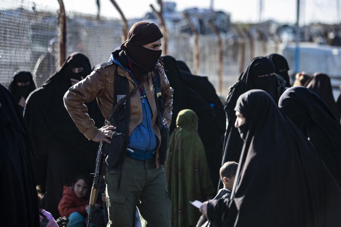 Syrians wait to leave the Kurdish-run al-Hol camp which holds relatives of alleged Islamic State (IS) group fighters, in the Syrian northeastern al-Hasakeh governorate on December 10, 2020. (FILE/AFP)