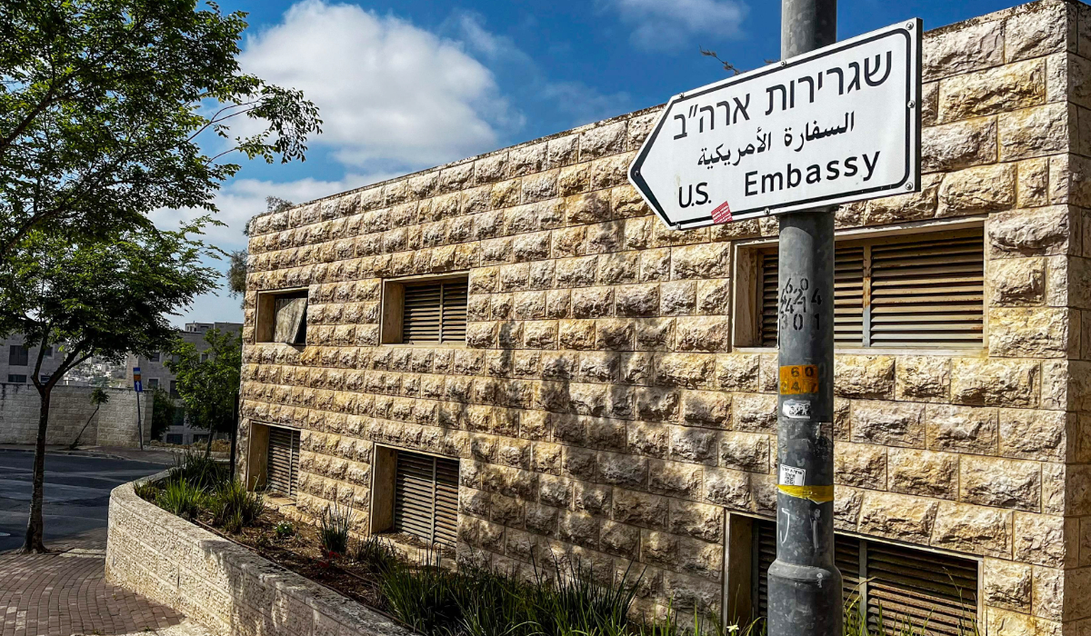 A road sign shows the way towards the US embassy in Jerusalem on April 19, 2024. (AFP)