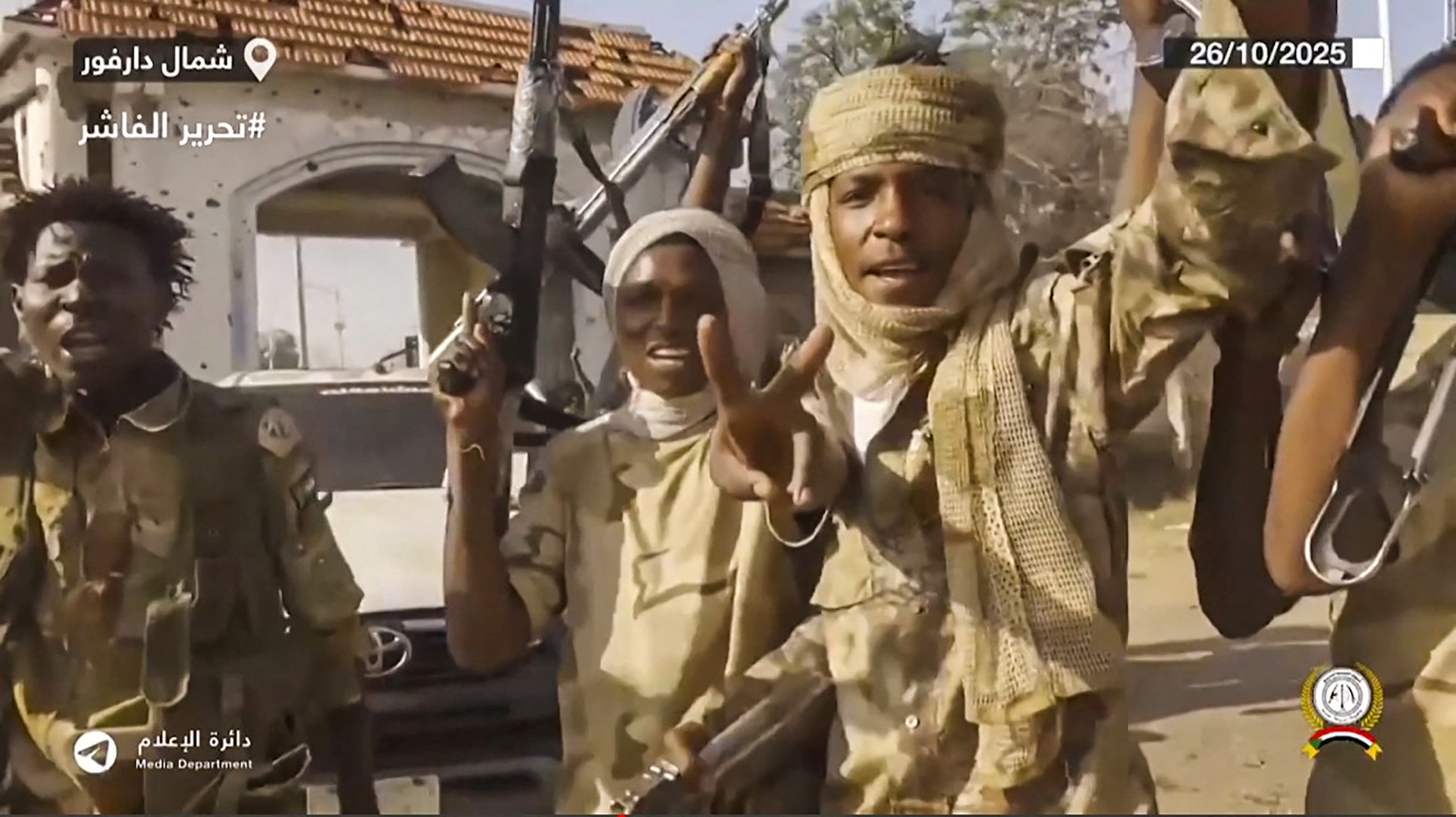 Above, Rapid Support Forces fighters in the streets of El-Fasher in Sudan’s Darfur in this image grab released on Oc. 26, 2025. (AFP file photo)