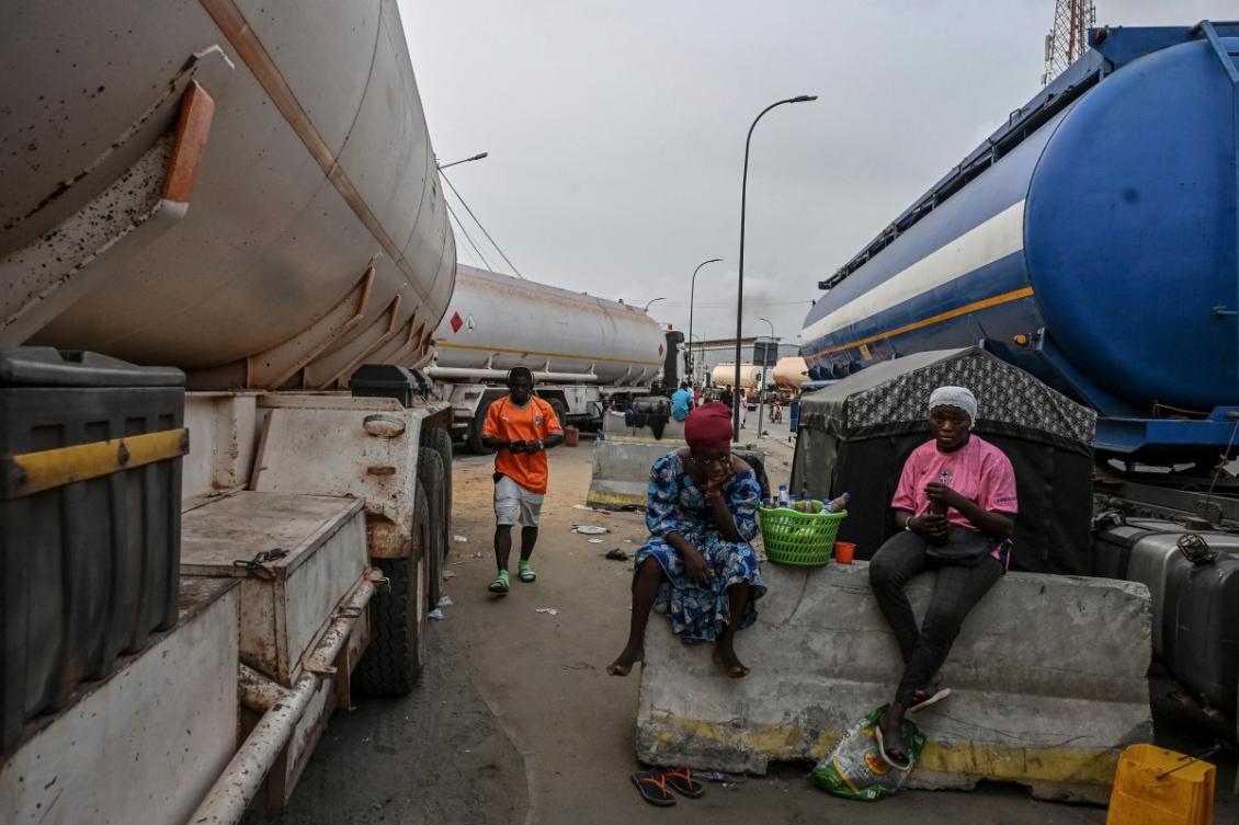 Malian tanker trucks wait to load fuel in the front of the Ivorian Refining Company (SIR) in Abidjan on January 15, 2026.(AFP)