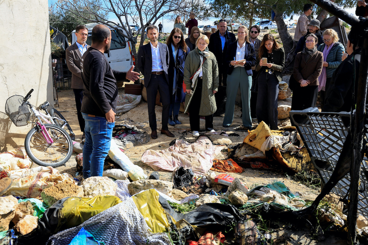 Members of a European Union delegation visit a site damaged by Israeli settlers in Susiya near Hebron on Wednesday. (Reuters)