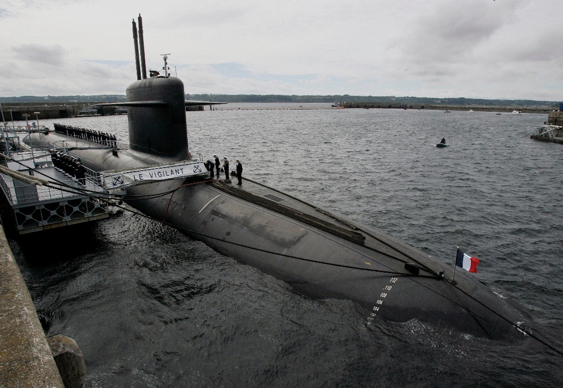 French Marine officers wait atop "Le Vigilant" nuclear submarine at L'Ile Longue military base, near Brest, Brittany, France. (AP)