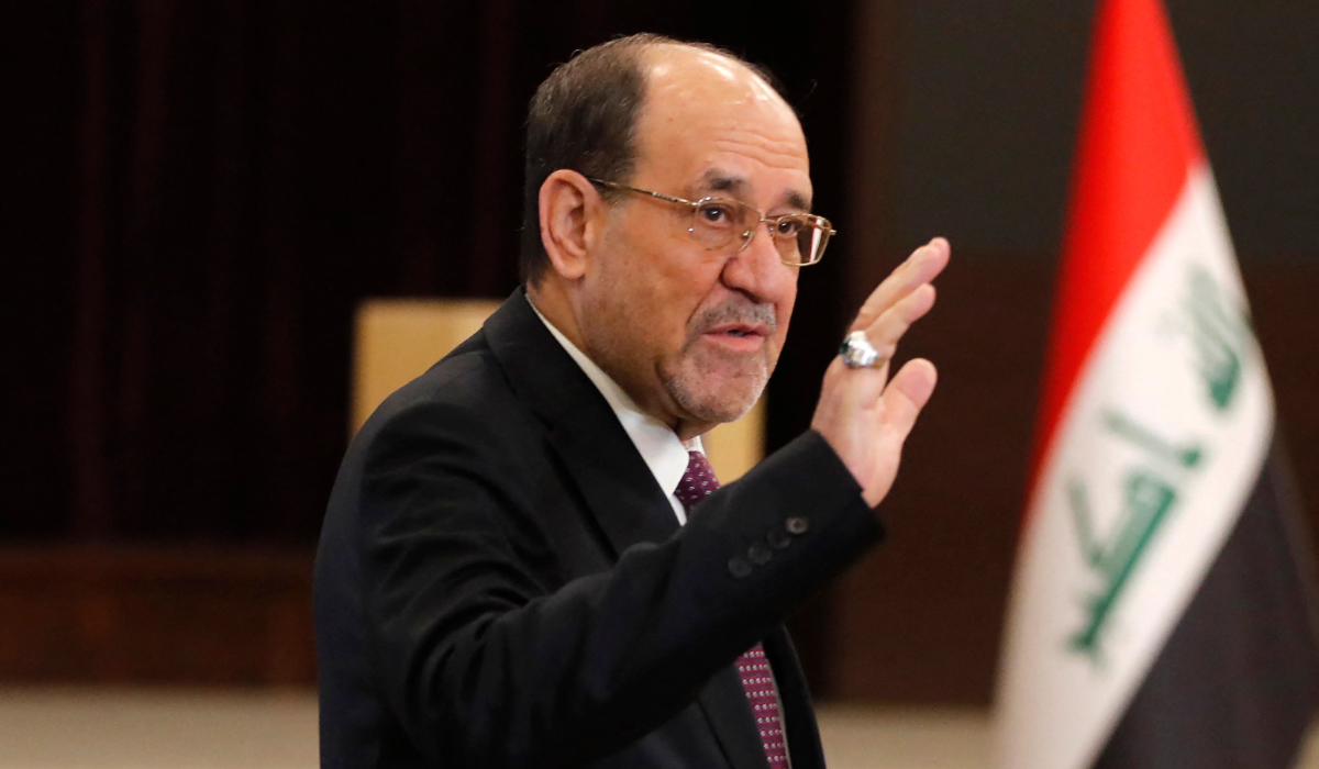 Former Iraqi Prime Minister Nouri al-Maliki leaves after casting his ballot at a polling station in Baghdad on November 11, 2025 during Iraq's parliamentary elections. (AFP)