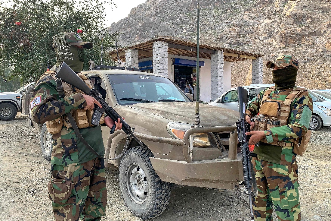Taliban security personnel stand guard near the Torkham border crossing between Afghanistan and Pakistan in the Nangarhar province. (AFP)