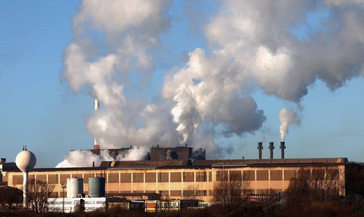Smoke rises from chimneys at a factory in the port of Dunkirk, France. (Reuters)