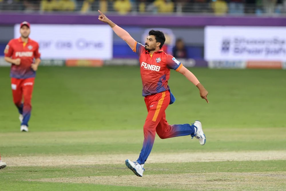 Haider Ali of Dubai Capitals celebrates the wicket of Tom Abell of Sharjah Warriorz during the DP World ILT20 match held at the Dubai International Cricket Stadium in December. (CREIMAS/ILT20)