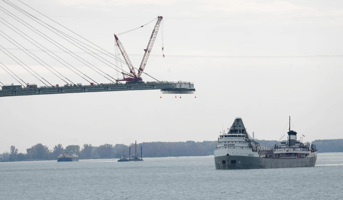 The Saginaw passes construction on the Gordie Howe International Bridge connecting on the Detroit River connecting Windsor, Ontario and Detroit, Oct. 25, 2023. (AP)