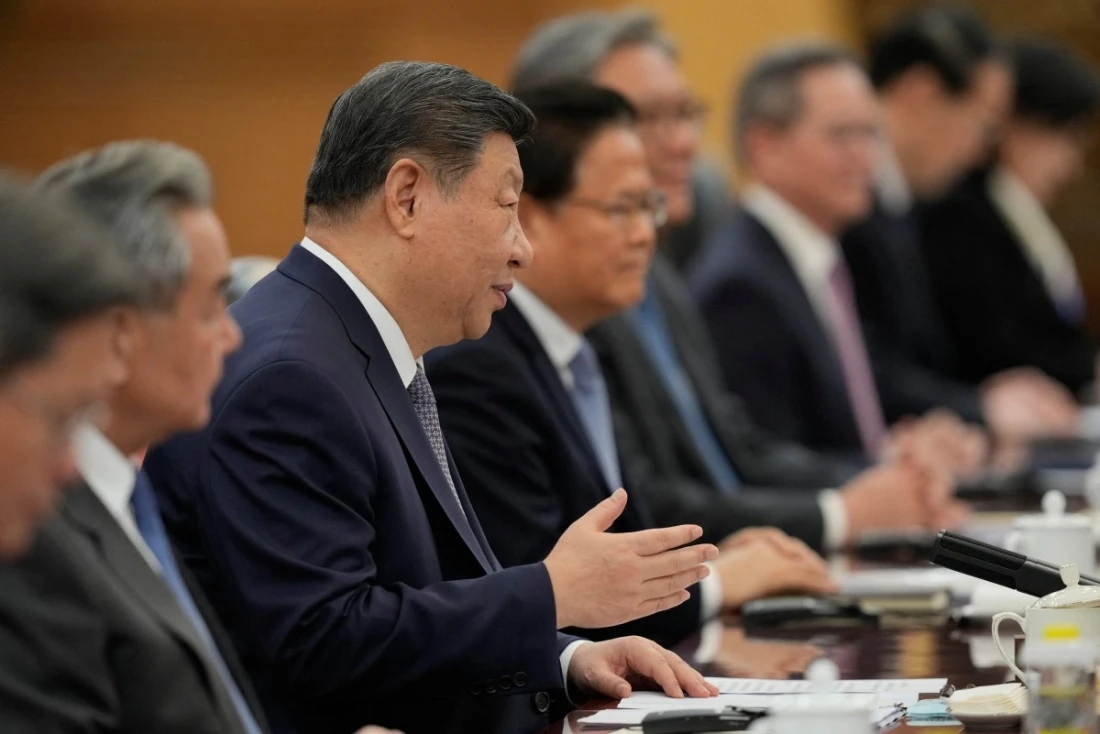 China's President Xi Jinping speaks during a meeting with Britain's Prime Minister Keir Starmer at the Great Hall of the People in Beijing, China. (AFP)