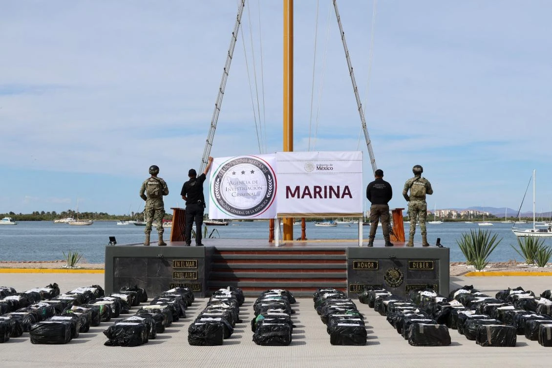 Marine armed forces display seized packages of cocaine in Manzanillo, Mexico on Feb. 11, 2026 after a ‘coordinated operation’ between the Mexican Navy and the United States Coast Guard in the Pacific Ocean. (Mexican Navy/AFP)
