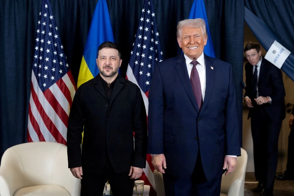 Ukraine’s President Volodymyr Zelensky with US President Donald Trump in Davos, Switzerland, January 22, 2026. (Ukrainian Presidential Press Service/Reuters/File)