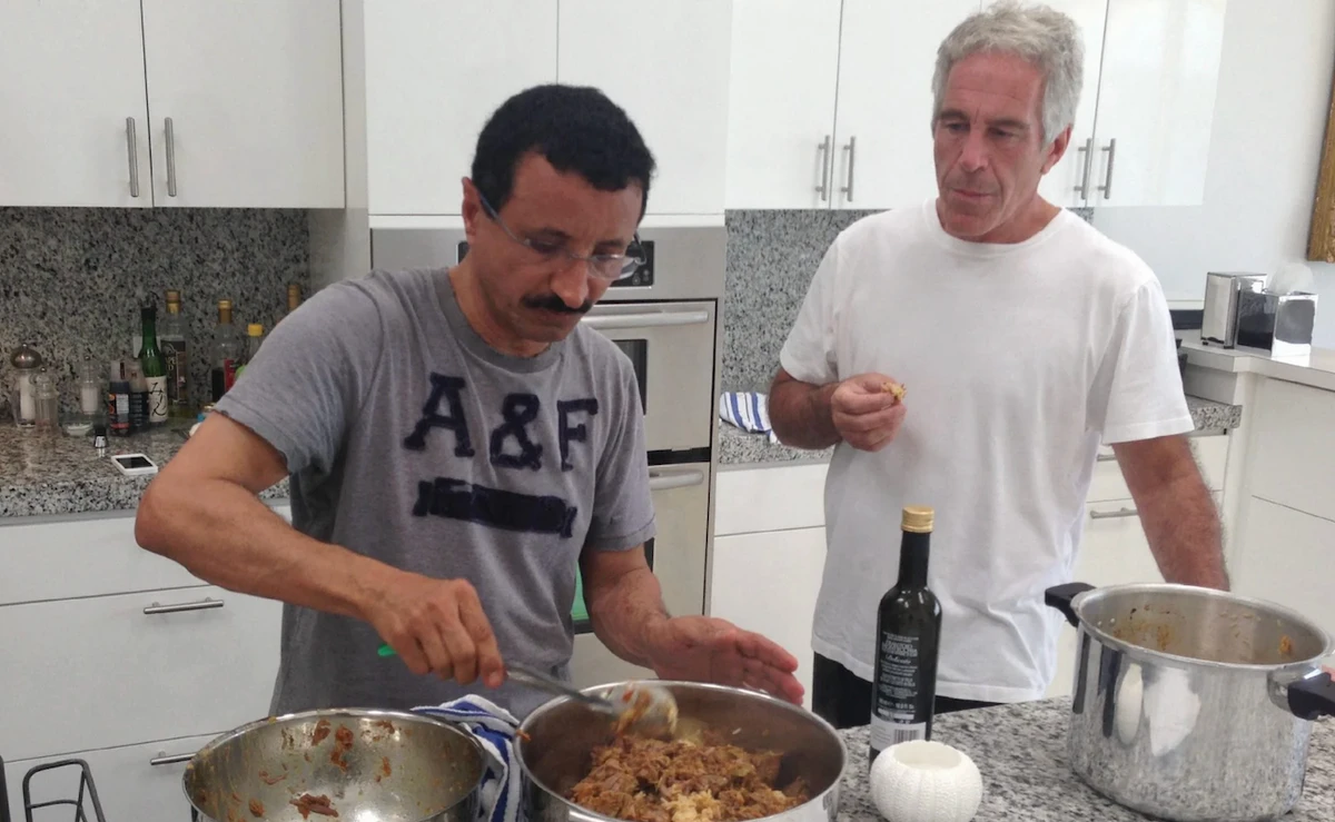 An undated photograph that appears in an email and is publicly available shows Epstein cooking with Bin Sulayem and the two of them looking relaxed together. (AFP)