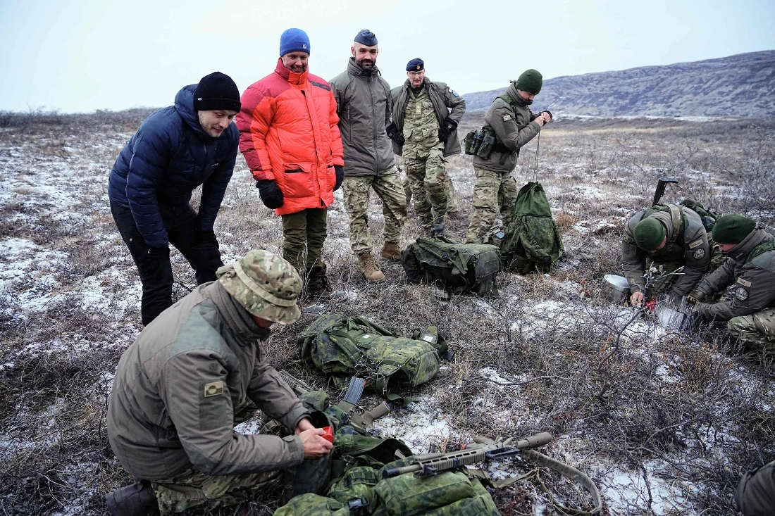 King Frederik X of Denmark and Greenland's Prime Minister Jens-Frederik Nielsen visit the Arctic Basic Training in Kangerlussuaq, Greenland. (AFP)