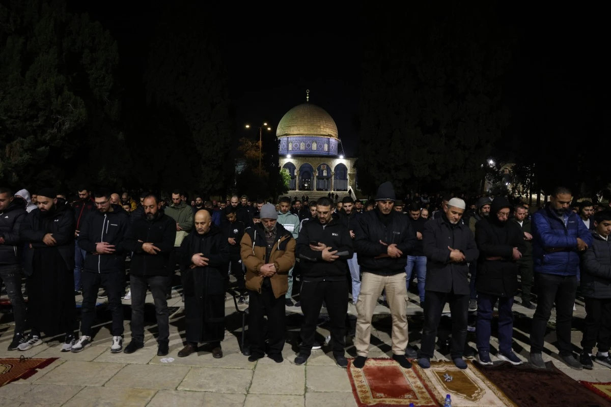 Muslim worshippers perform Tarawih prayers on the first night of the Islamic holy month of Ramadan near the Dome of the Rock at the Al-Aqsa Mosque compound in the Old City of Jerusalem, Feb. 17, 2026. (AFP)
