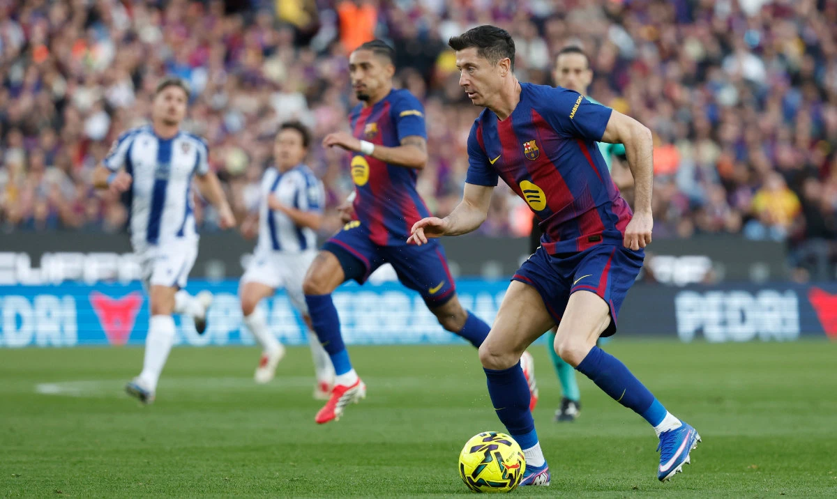 Barcelona's Robert Lewandowski in action during a La Liga soccer match between Barcelona and Levante in Barcelona, Spain, Sunday, Feb. 22, 2026. (AP)