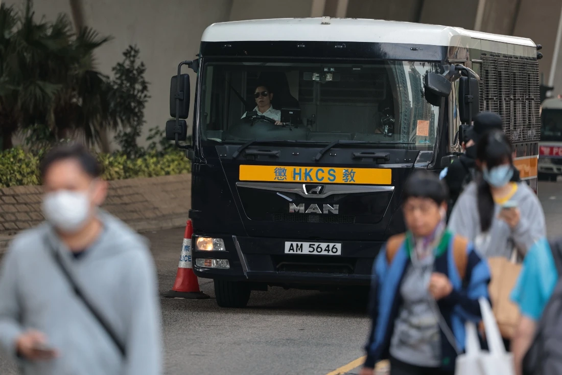 A Correctional Services Department vehicle believed to be carrying Hong Kong pro-democracy activists arrives at the West Kowloon Law Courts Building ahead of the national security appeal cases, in Hong Kong. (AP)