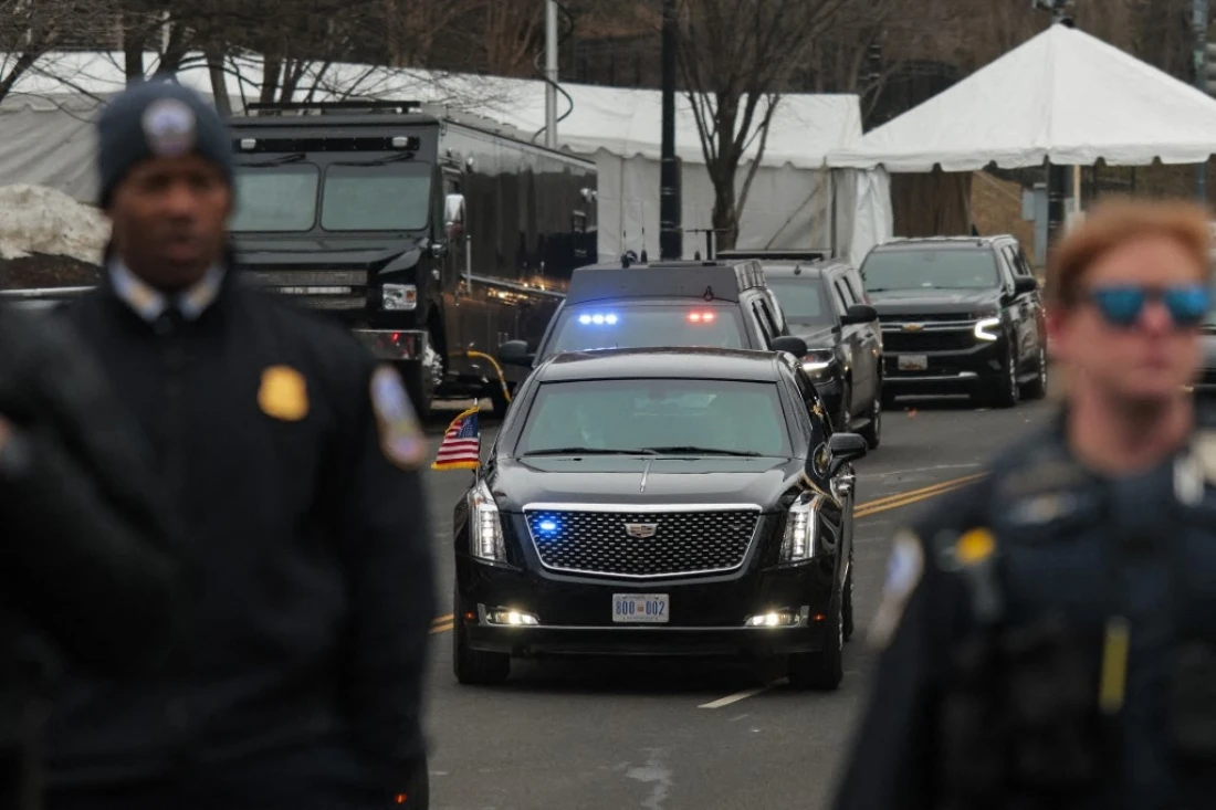 US Secret Service and Metropolitan Police stand between Anti-Trump and pro-Palestine protesters and the presidential motorcade outside the Donald J. Trump Institute of Peace in Washington, US. (AFP)
