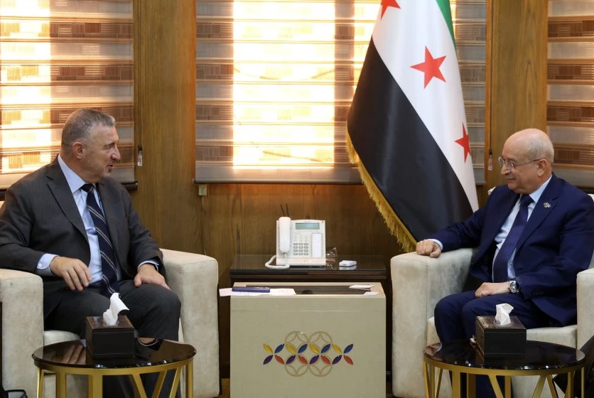 Syrian Transport Minister Yarub Badr, right, with World Bank Regional Director for the Middle East Jean-Christophe Carret. SANA
