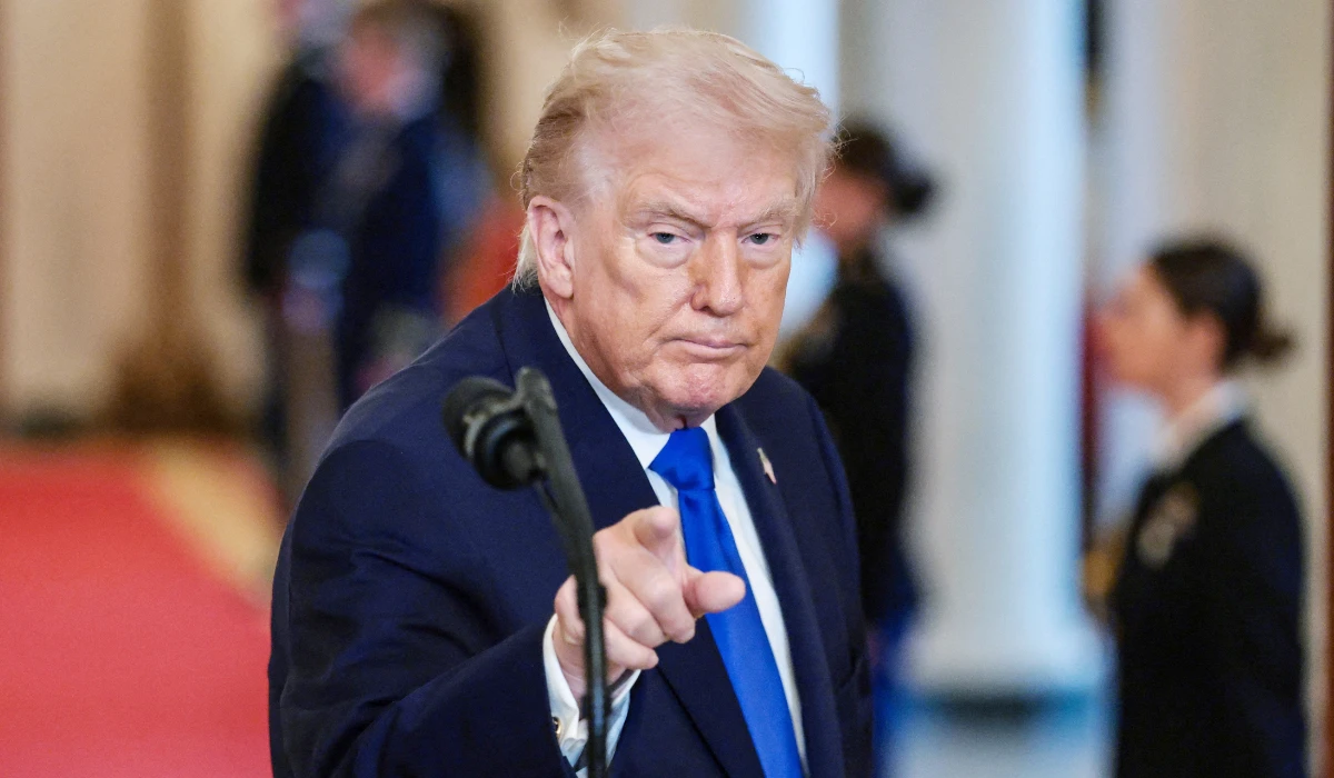 U.S. President Donald Trump gestures at the end of an event to honor "Angel Families" who have lost family members to crimes committed by people in the country illegally, at the White House in Washington, D.C., U.S., February 23, 2026. (REUTERS)