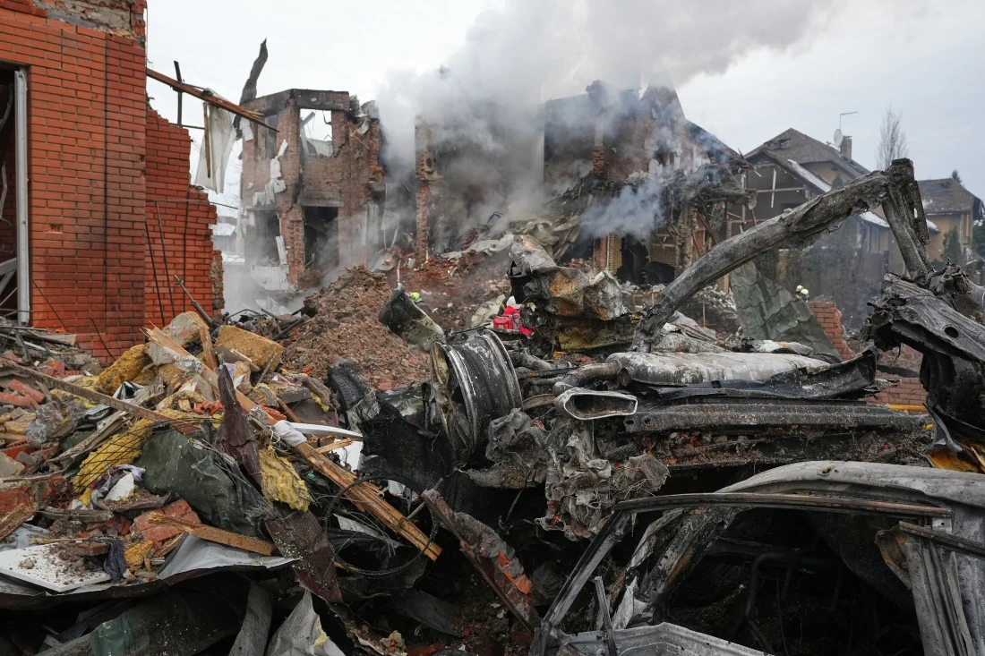 Firefighters put out a fire after a drone hit a residential building during a Russian air attack in Kyiv, Ukraine. (AP)