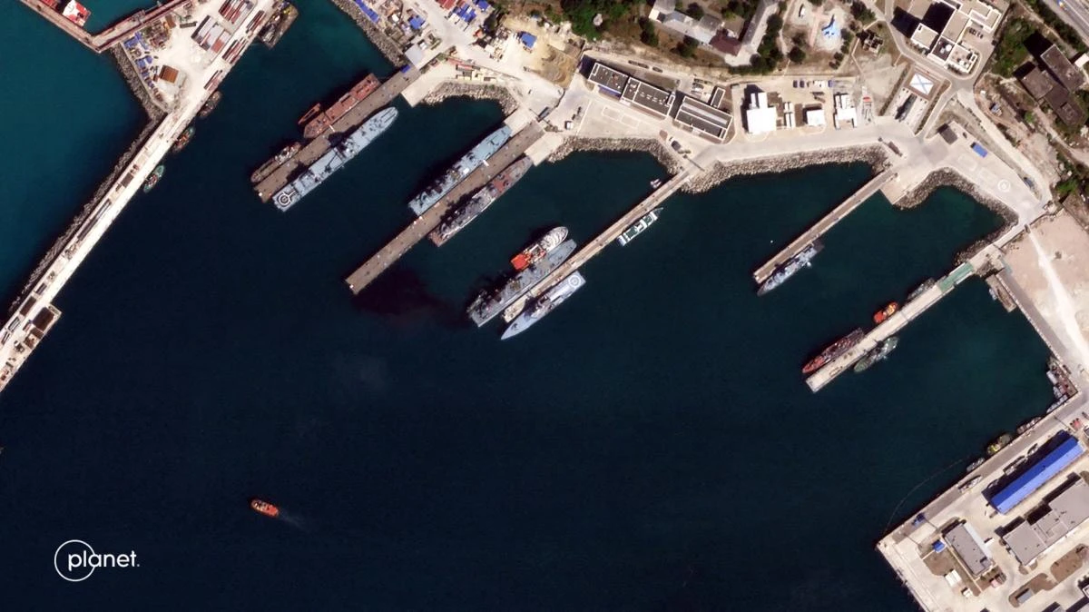 Above, an aerial view of the port Novorossiysk, south of the Kerch Strait on Aug. 7, 2023. The port halted oil exports after a Ukrainian drone attack last week. (AFP file photo)