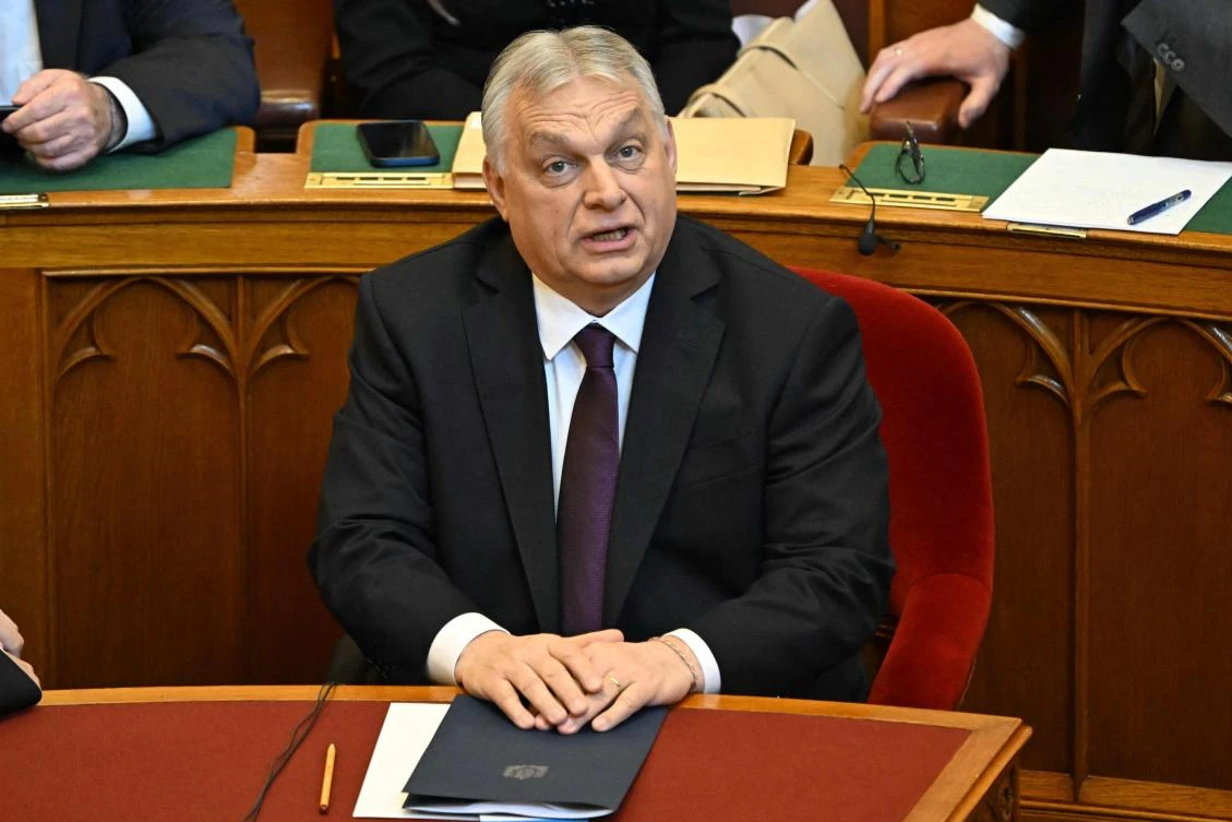 Hungarian Prime Minister Viktor Orban reacts prior to delivering a speech before the agenda during the spring session of the Hungarian Parliament in Budapest, Hungary, on February 23, 2026. (Photo by Attila KISBENEDEK / AFP)