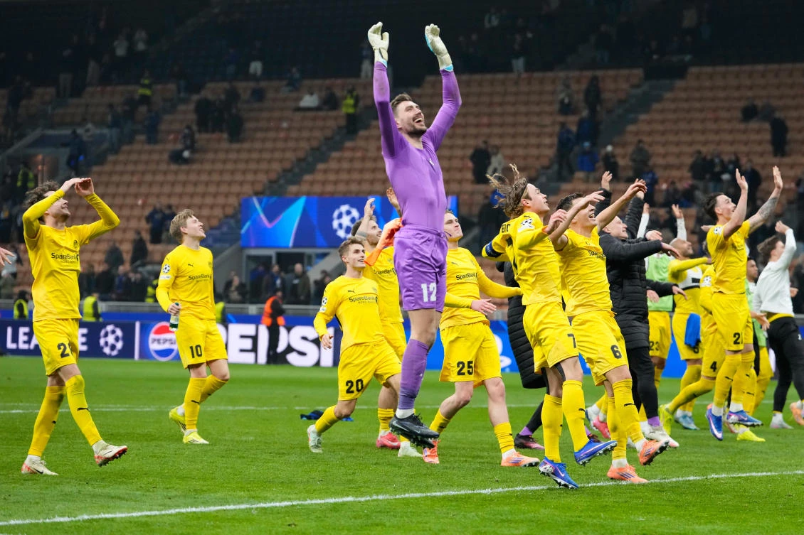Glimt’s players celebrate at the end of the Champions League playoff soccer match between Inter Milan and Bodo Glimt, at the San Siro stadium in Milan, Feb.24, 2026. (AP)