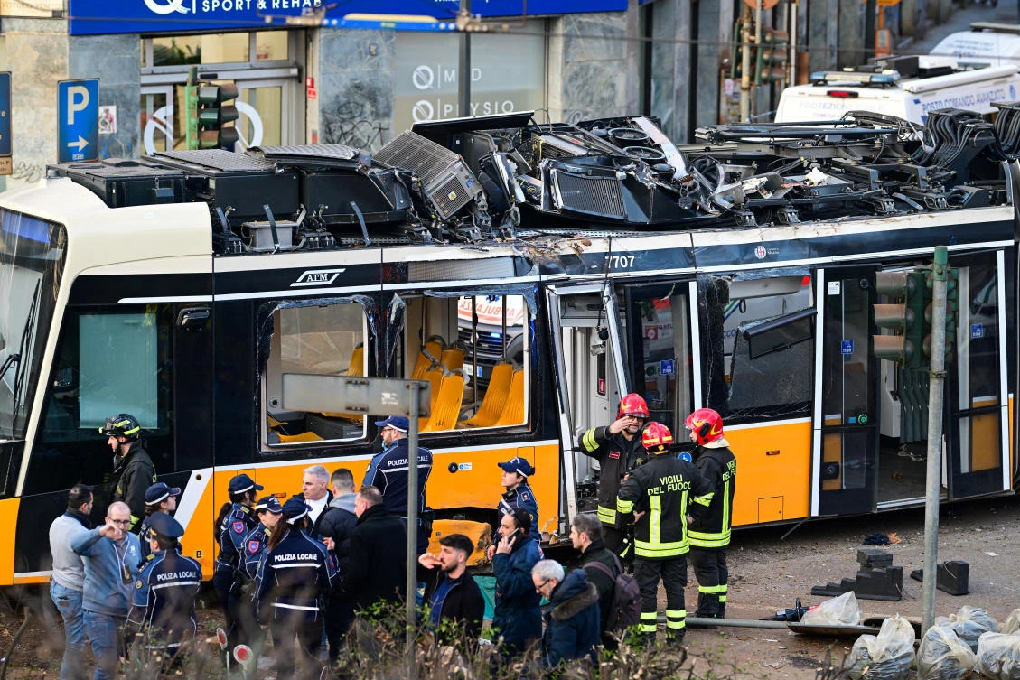 Emergency services work at the scene following a deadly tram derailment in Milan, Feb. 27, 2026. (Reuters)