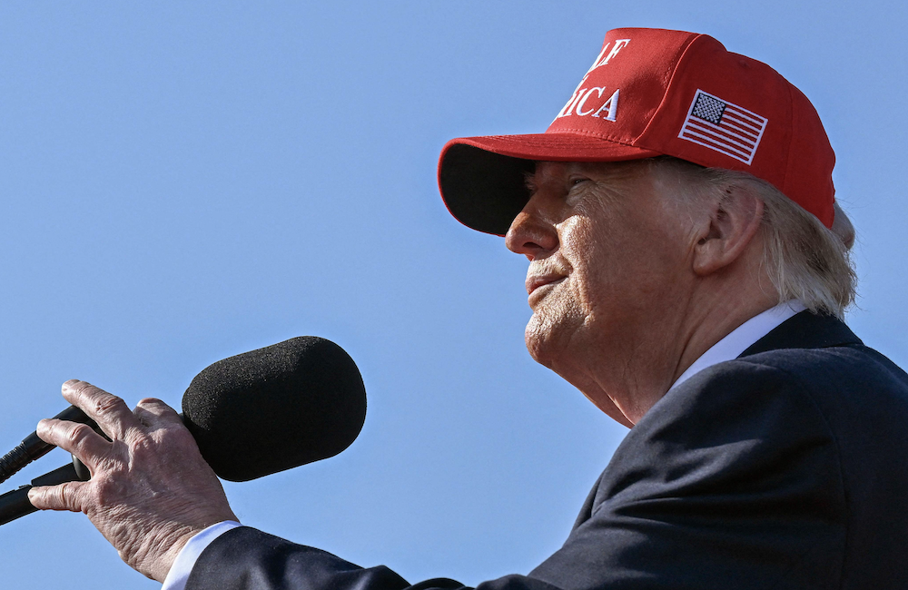 President Donald Trump gets ready to speak to a crowd at the Port of Corpus Christi. (AFP)