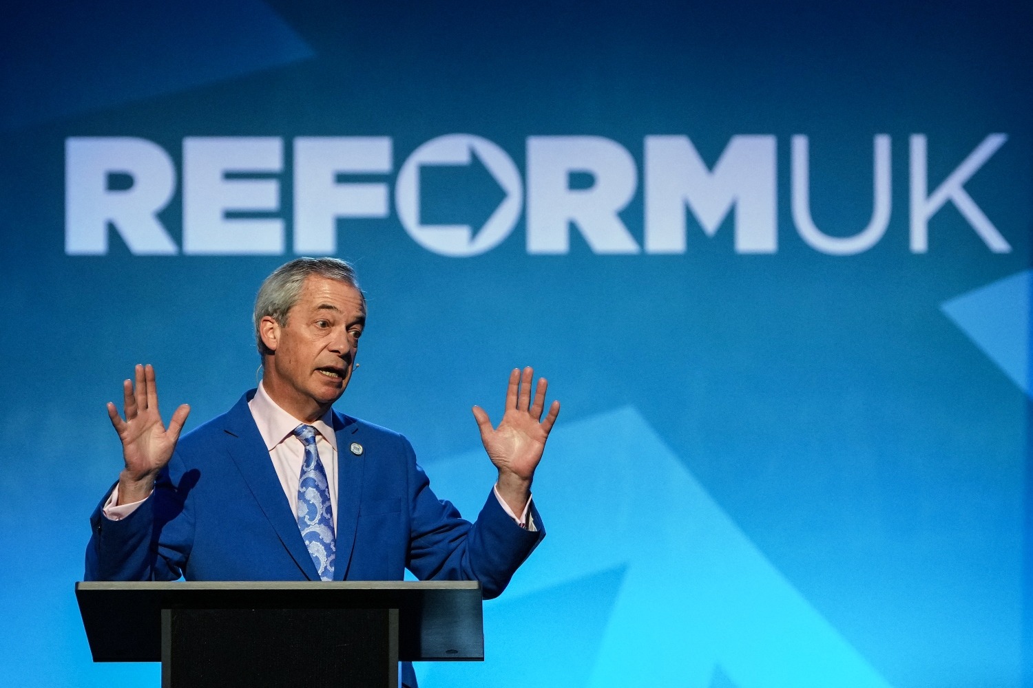 Reform UK is using the same rhetoric of capitalizing on the division of society into “us and them” (File/AFP)