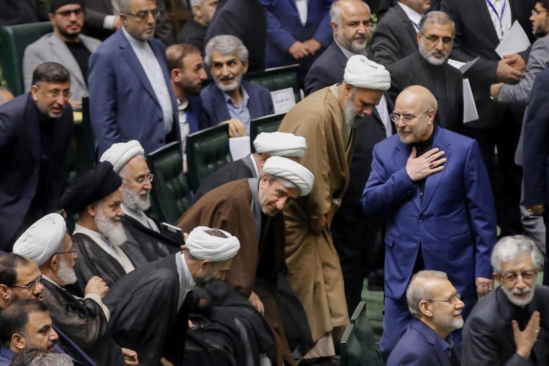 Mohammad Bagher Qalibaf is the highest-ranking official to appear on camera since the attacks began Saturday. Above, Qalibaf, right, greets lawmakers during the inauguration session for the new Parliament in Tehran on May 27, 2024. (AFP)