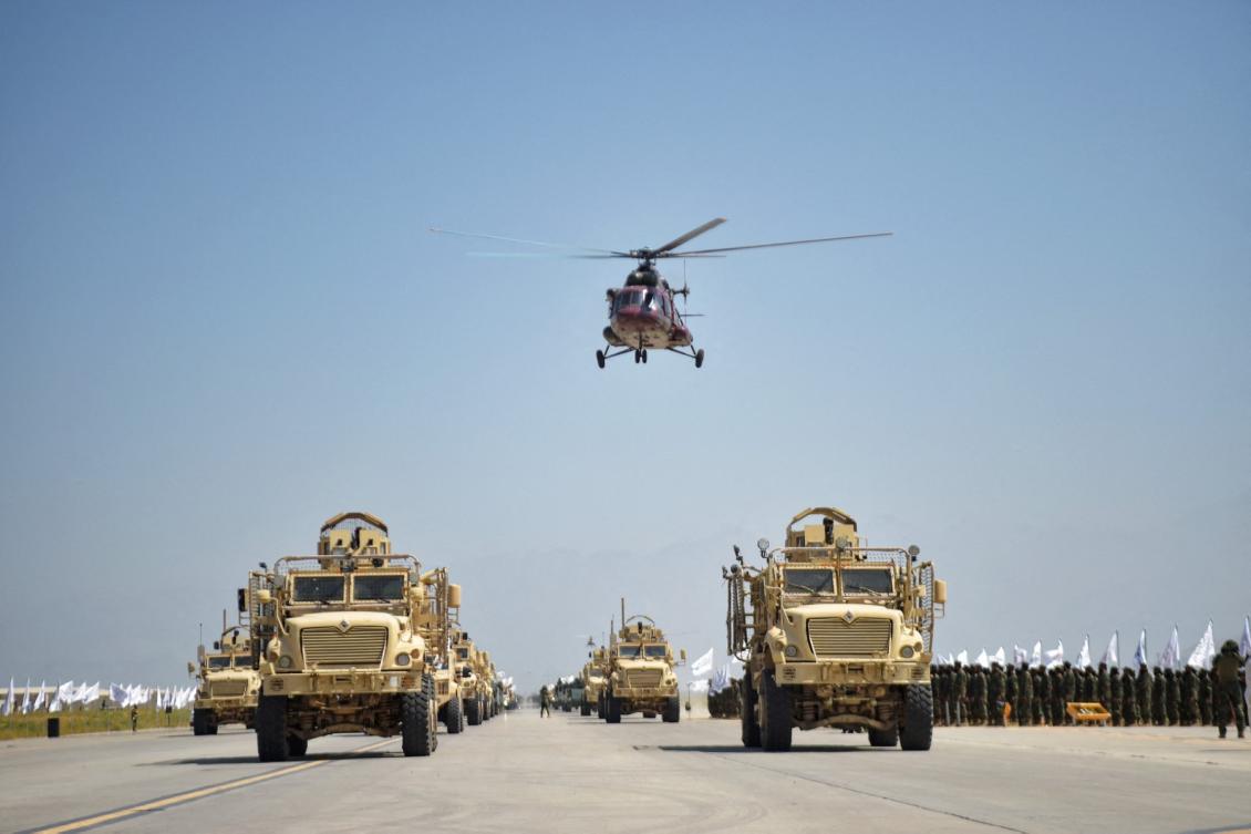 Military vehicles parade to celebrate the third anniversary of Taliban’s takeover of Afghanistan at the Bagram Air Base in Parwan province on Aug. 14, 2024. (AFP)
