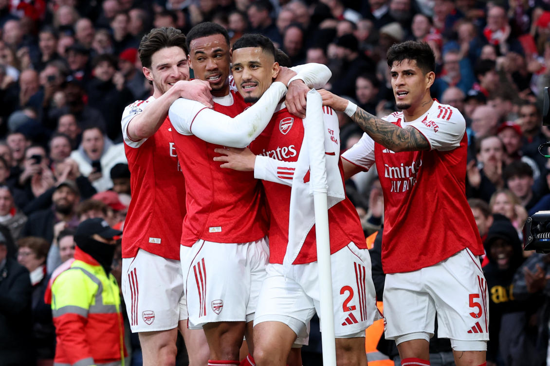 Arsenal’s William Saliba celebrates scoring their first goal against Chelsea with Gabriel Magalhaes, Declan Rice and Piero Hincapie. (Action Images via Reuters)