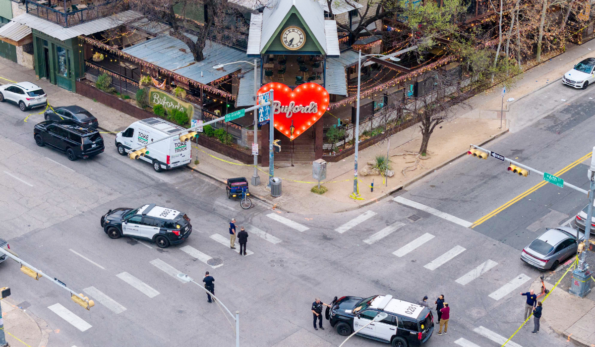 In an aerial view, members of the FBI and local law enforcement patrol and perform an investigation after a mass shooting outside of Buford's bar in downtown on March 01, 2026 in Austin, Texas. (AFP)