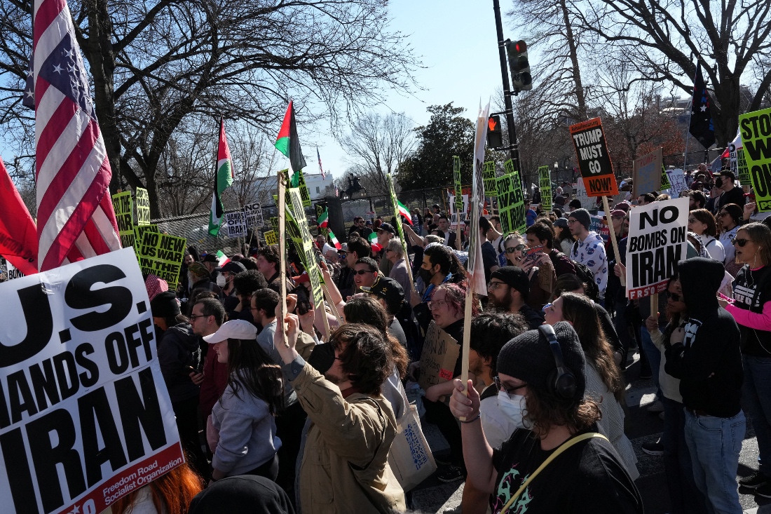Demonstrators take part in an anti-war with Iran protest rally and march in Washington, US. (Reuters)