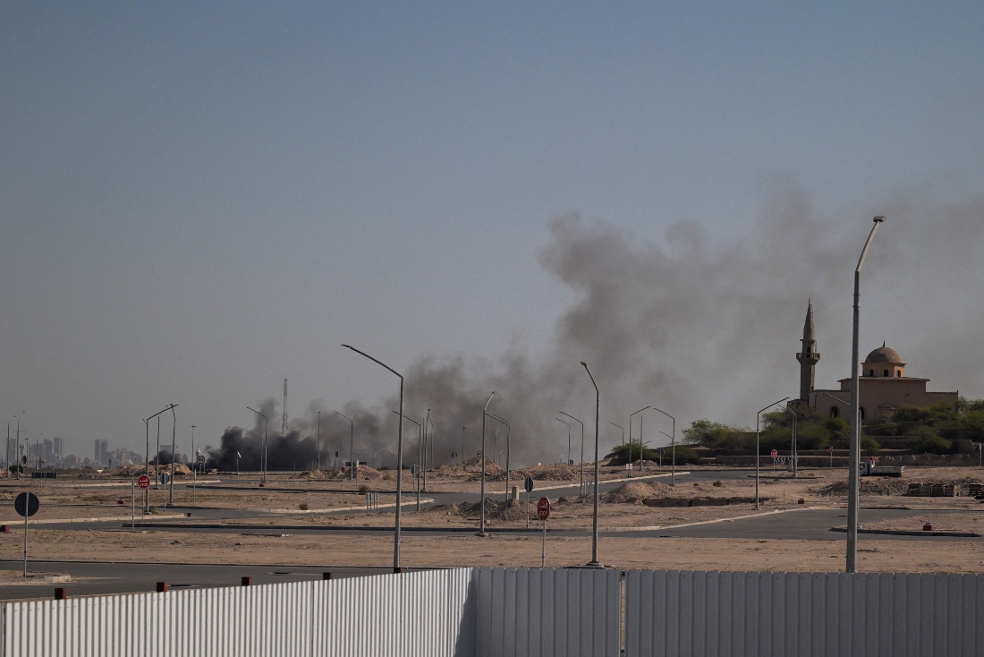 Smoke rises from a reported Iranian strike in the area where the US Embassy is located in Kuwait City. (AFP)