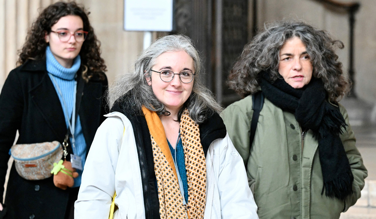 Sister of Samuel Paty, Gaelle Paty (C), leaves after a break of the appeal trial of four people accused of involvement in the jihadist beheading of schoolteacher Samuel Paty in 2020, at the Palais de Justice, Paris' courthouse on January 26, 2026. (AFP)