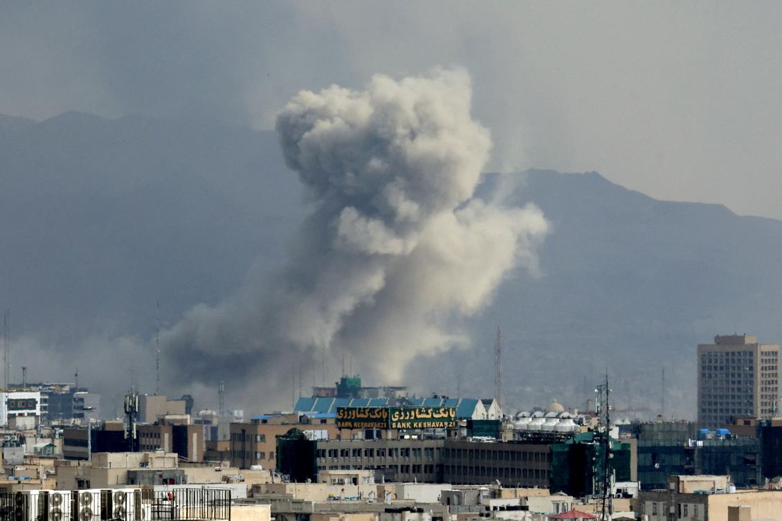 A plume of smoke acends after a military strike on the capital Tehran on March 2, 2026. (AFP)