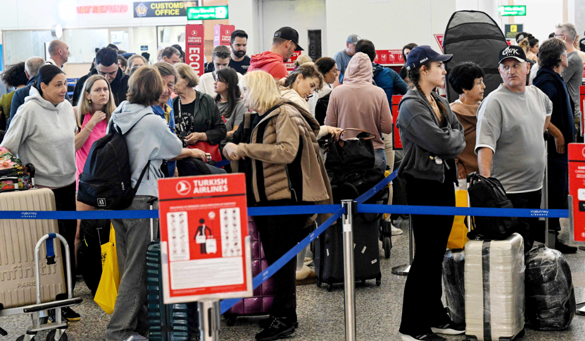 Foreign tourists who came to Bali to enjoy the scenic beauty of Indonesia’s resort island wait to return home amid flight disruptions at Ngurah Rai International Airport. (AFP)