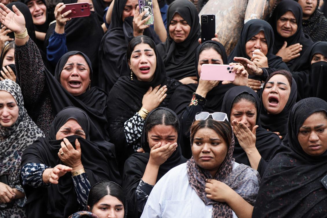 In this picture obtained from Iran's ISNA news agency, mourners cry during the funeral of children killed in a reported strike on a primary school in Iran’s Hormozgan province, in Minab on March 3, 2026. (AFP)
