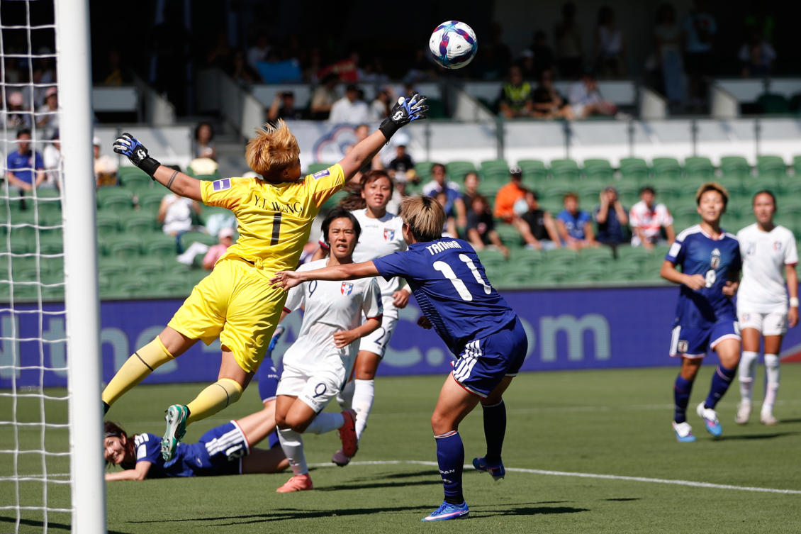 Taiwan’s goalkeeper Wang Yu-ting punches the ball clear of the goal during the Women’s Asia Cup soccer match between Japan and Taiwan in Perth, Mar. 4, 2026. (AP)