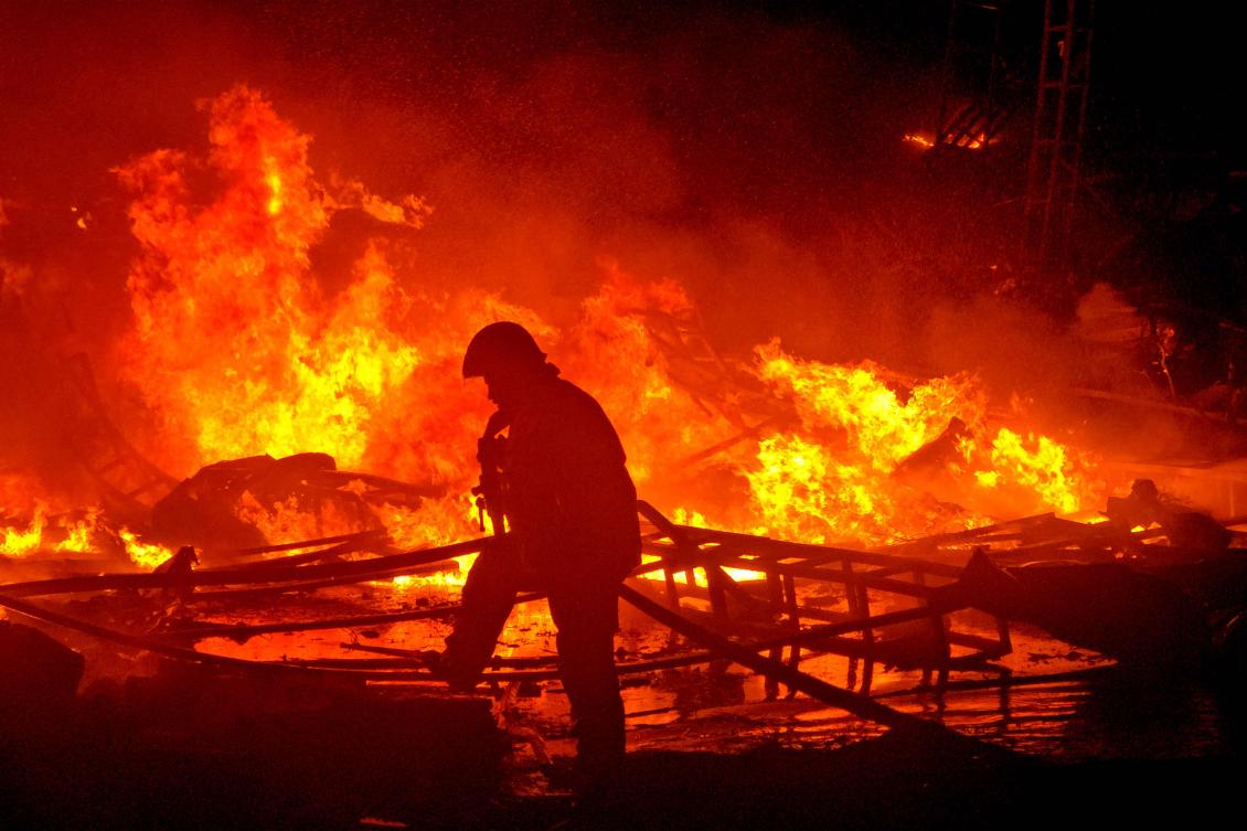 Civil defense forces attempt to extinguish a blaze that erupted after Israeli bombardment on a solar farm and electricity generation facility in Lebanon’s southern coastal city of Tyre on Mar. 4, 2026. (AFP)
