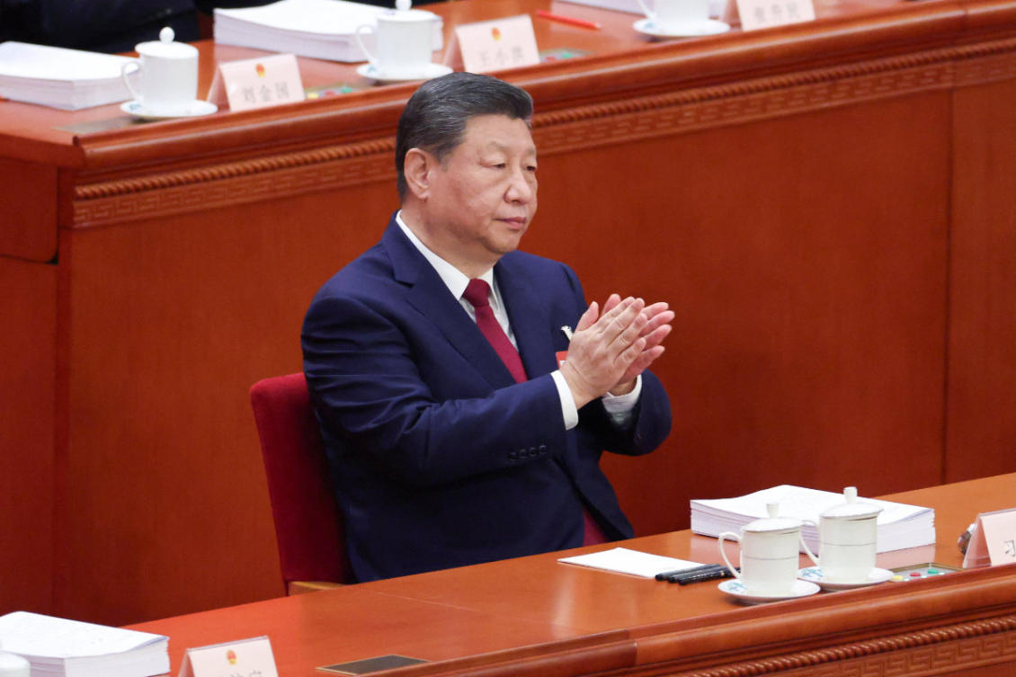 Chinese President Xi Jinping applauds during the opening session of the National People's Congress (NPC) at the Great Hall of the People in Beijing, China March 5, 2026. (REUTERS)